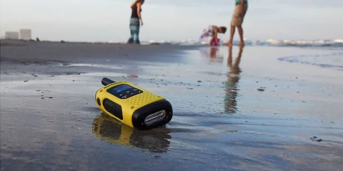 Walkie talkie on the sand